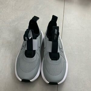 New nike slide on sneakers for kids. Never worn.